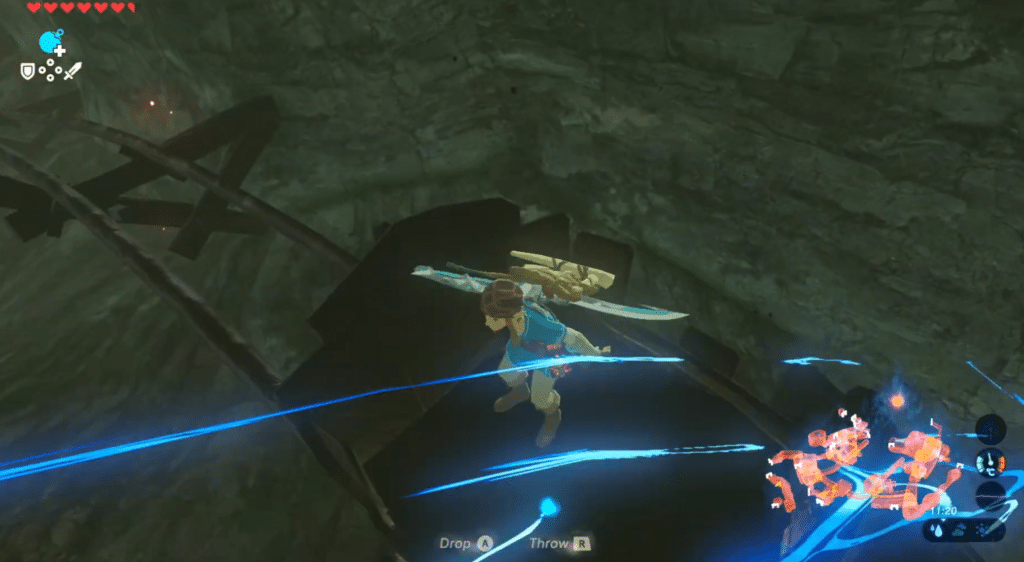 Uncharted Cartway - Link riding a cart on the secret entrance 
